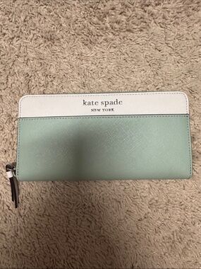 kate spade mint and white zip-around wallet